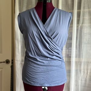 Ann Taylor knit surplice faux wrap tank, size L, color is slate blue.